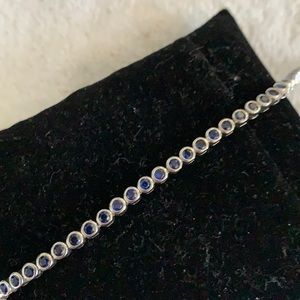 Sterling silver bracelet with blue stone